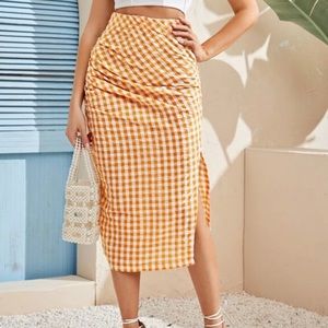 A orange and white skirt